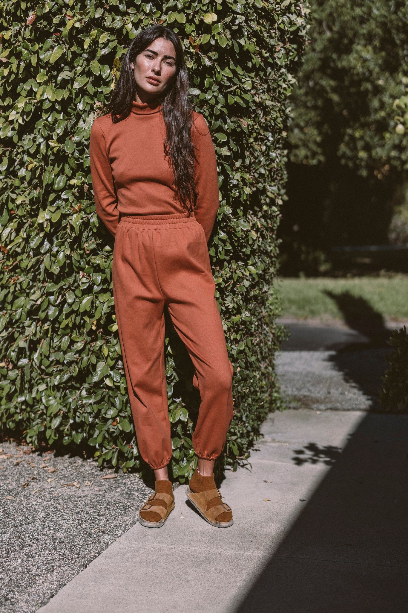 the tia turtleneck in terracotta