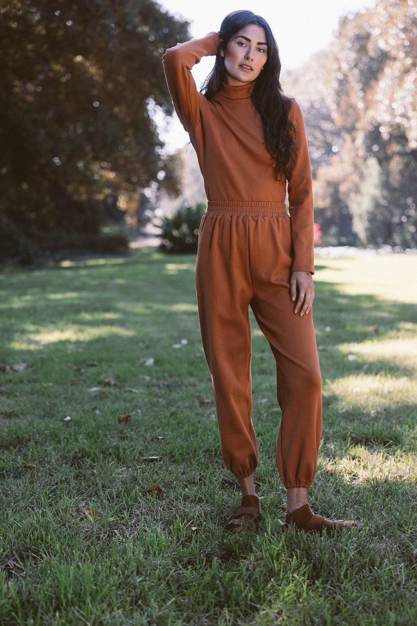 the tia turtleneck in terracotta